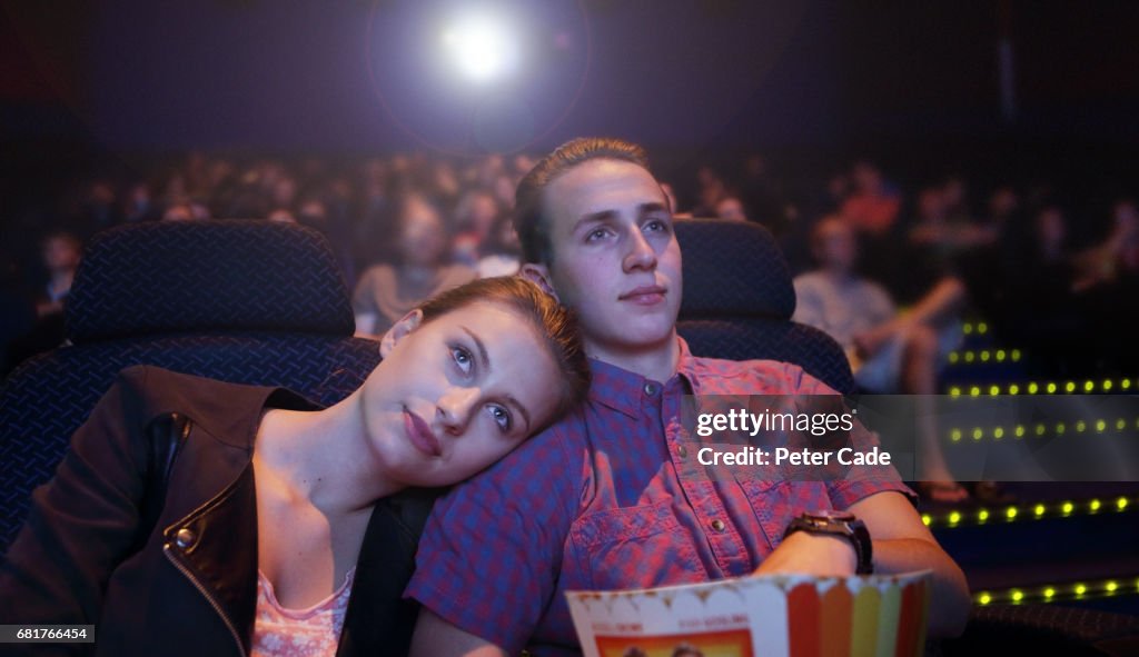 Young couple in cinema