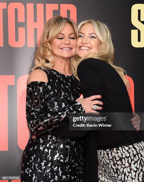 Actresses Goldie Hawn and her daughter Kate Hudson arrive at the premiere of 20th Century Fox's "Snatched" at the Village Theatre on May 10, 2017 in...