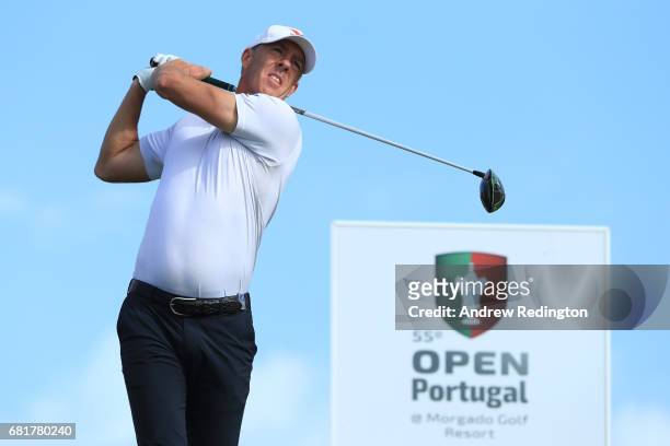 Richard Green of Australia hits his tee shot on the 13th hole during the first round of the Open de Portugal at the Morgado Golf Resort on May 11,...