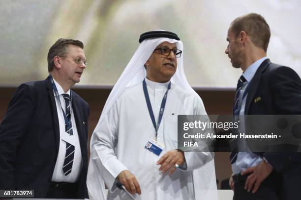 Council Member and UEFA President Aleksander Ceferin talks to FIFA Council Members Sheikh Salman Bin Ebrahim Al Khalifa and FIFA Council Member and...