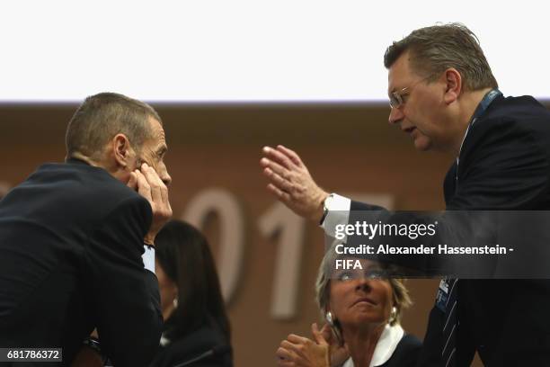 Council Member and President of the German Football Association Reinhard Grindel talks to FIFA Council Member Evelina Christillin and FIFA Council...