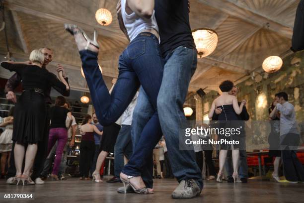 Dancers perfom Argentine tango during an afternoon milonga event in Hevre Pub, an event that was a part of Krakus Aires Tango Festival 2017, a...