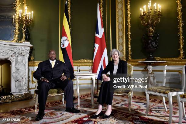 Prime Minister Theresa May meets President Yoweri Museveni of Uganda during the London Conference on Somalia at Lancaster House on May 11, 2017 in...