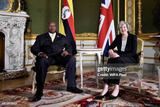 Prime Minister Theresa May meets President Yoweri Museveni of Uganda during the London Conference on Somalia at Lancaster House on May 11, 2017 in...