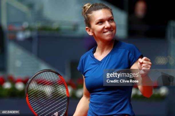 Simona Halep of Romania celebrates victory during her match against CoCo Vandeweghe of USA on day six of the Mutua Madrid Open tennis at La Caja...