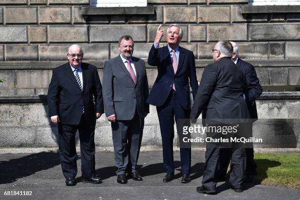 European Commission Chief Brexit Negotiator Michel Barnier points skywards as he arrives at Leinster House greeted by House speakers Sean O'...