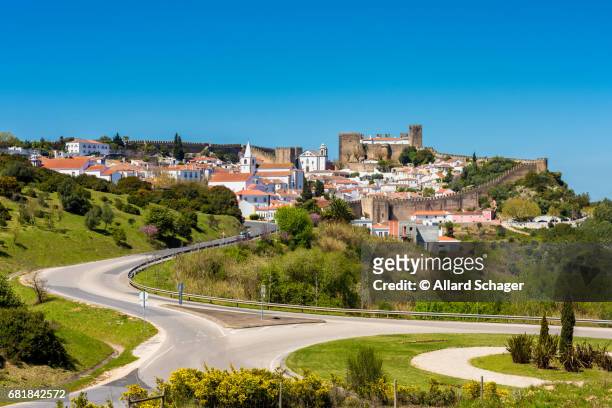 town of obidos portugal and its wall and castle - leiria district imagens e fotografias de stock