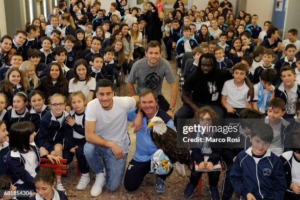 Senas Lulic, Thomas Strakoscha and Jordan Lukaku of SS Lazio meet students at the San Giuseppe Caburlotto school on May 11, 2017 in Rome, Italy.