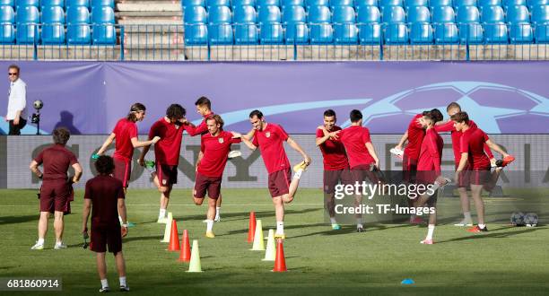 Players of Atletico Madrid warm up during a training session ahead of the UEFA Champions League Semifinal Second leg match between Club Atletico de...