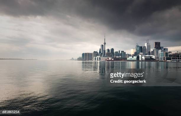 toronto storm skyline - grey pier stock pictures, royalty-free photos & images