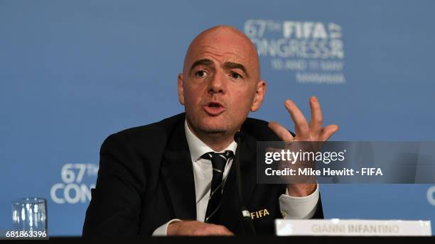 President Gianni Infantino faces the media during a press conference following the 67th FIFA Congress at the Bahrain International Exhibition &...