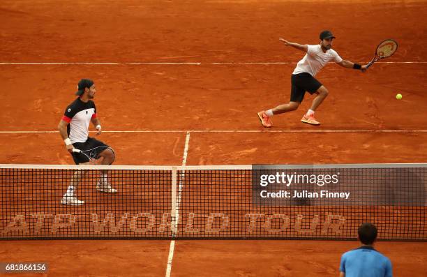 Fabio Fognini of Italy and Treat Huey of Philippinnes in action in their doubles match against Marcel Granollers of Spain and Ivan Dodig of Croatia...