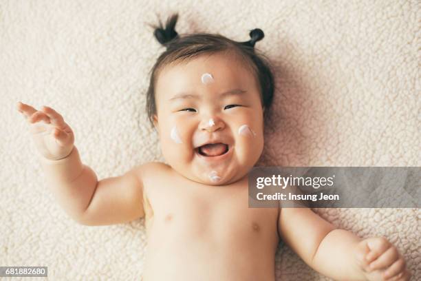 laughing baby girl - cute babies stock pictures, royalty-free photos & images