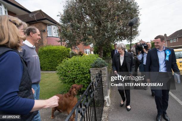 Britain's Prime Minister Theresa May meets local residents as she campaigns with Conservative candidate for the Southampton Test constituency, Paul...