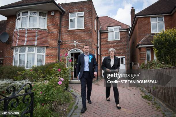 Britain's Prime Minister Theresa May meets local residents as she campaigns with Conservative candidate for the Southampton Test constituency, Paul...