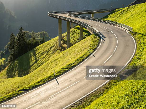 austria, vorarlberg, hochtannberg mountain pass - mountain road stock pictures, royalty-free photos & images