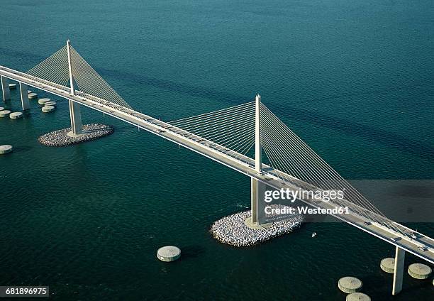 usa, florida, aerial photograph of the sunshine skyway bridge over tampa bay - tampa stock pictures, royalty-free photos & images