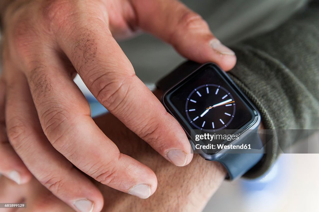 Businessman with smartwatch, close-up