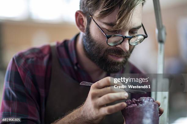 sculptor working in studio - sculptor stock-fotos und bilder