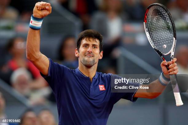 Novak Djokovic of Serbia celebrates his victory over Feliciano Lopez of Spain on day six of the Mutua Madrid Open tennis at La Caja Magica on May 11,...