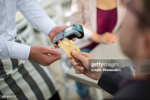 Giving Credit 269 Business Man Giving Credit Card Stock Photos, High-Res Pictures ...