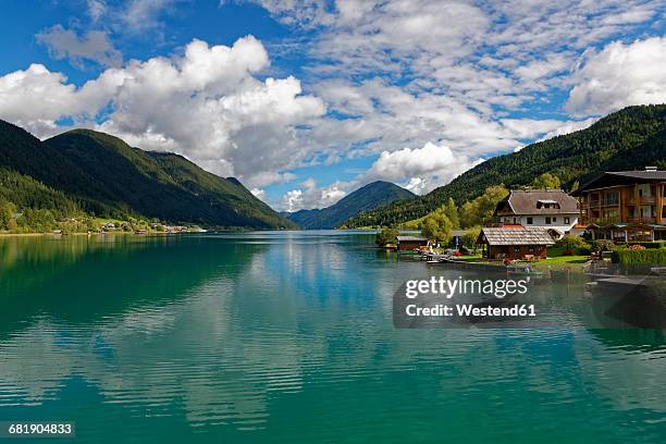 austria, carinthia, boat houses at lake weissensee - carinthia 個照片及圖片檔