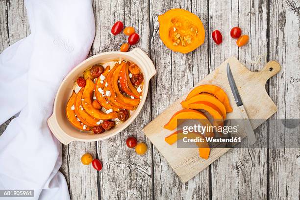 pumpkin gratin with tomato and feta cheese - hokaido pumpkin stock pictures, royalty-free photos & images