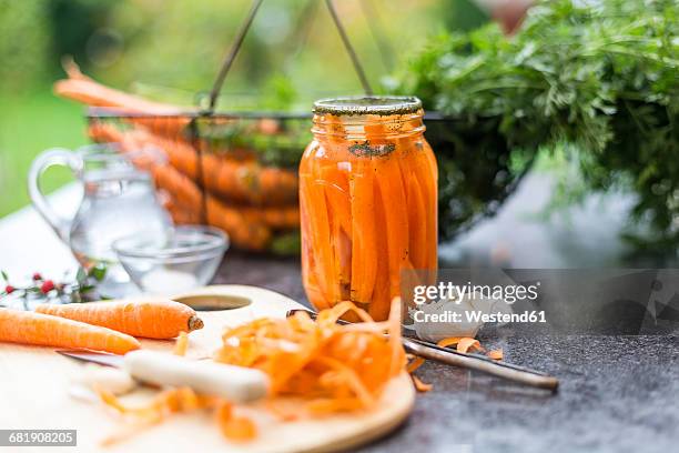 fermented carrots in preserving jar - pickle stock pictures, royalty-free photos & images