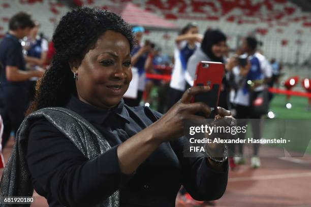 General Secretary Fatma Samba Diouf Samoura takes pictures during a FIFA Football Tournament, ahead of the 67th FIFA Congress, at Bahrain National...