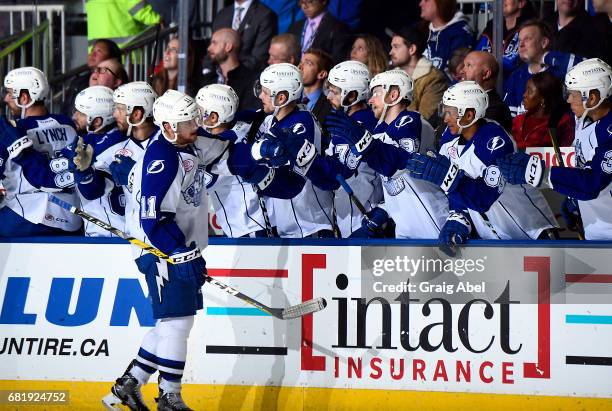 Erik Condra of the Syracuse Crunch celebrates his goal with teammates against the Toronto Marlies during game 3 action in the Division Final of the...