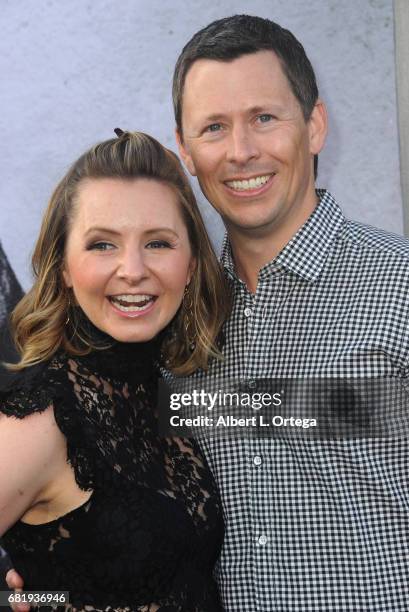 Actress Beverley Mitchell and husband Michael Cameron arrive for the Premiere Of Warner Bros. Pictures' "King Arthur: Legend Of The Sword" held at...