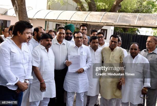 President Ajay Maken with other ex-MLAs coming out of LG house after meeting with LG Anil Baijal over Delhi Chief Minister Arvind Kejriwal's issue,...