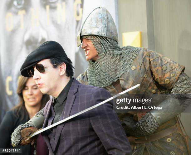 Musician Marilyn Manson arrives for the Premiere Of Warner Bros. Pictures' "King Arthur: Legend Of The Sword" held at TCL Chinese Theatre on May 8,...