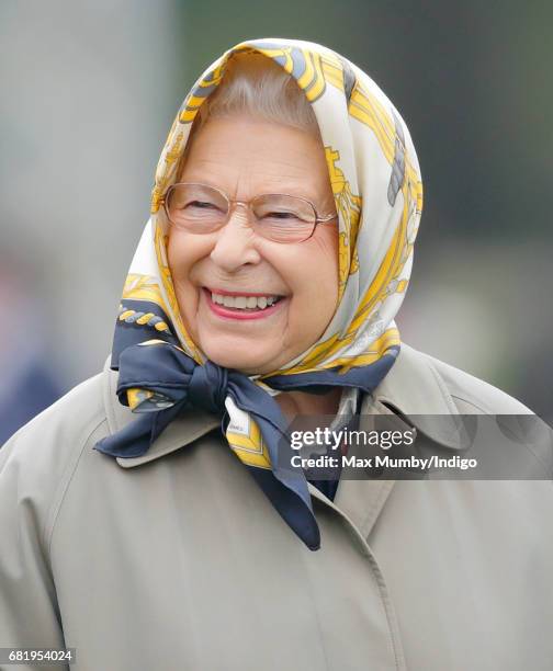 Queen Elizabeth II watches her horse 'Barber's Shop' win The Tattersalls and RoR Thoroughbred Ridden Show Series Championship on day 2 of the Royal...