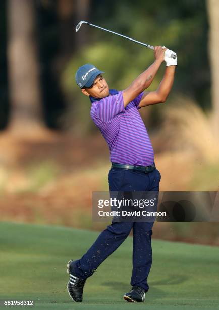 Fabian Gomez of Argentina plays his second shot on the par 4, 14th hole during the first round of THE PLAYERS Championship on the Stadium Course at...