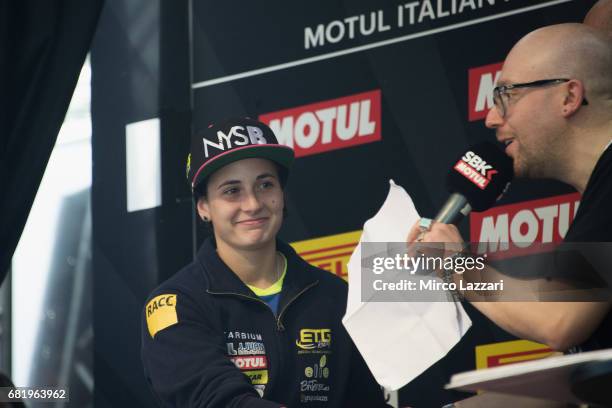 Ana Carrasco of Spain speaks with journalist during the the Paddock Show during the FIM Superbike World Championship - Preview at Misano World...