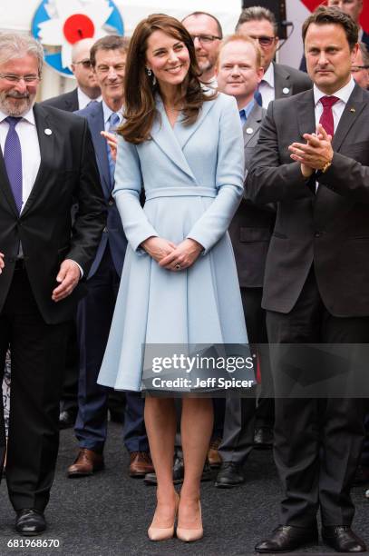 Catherine, Duchess of Cambridge with Xavier Bettel, Prime Minister of Luxembourg , tours a cycling themed festival and unveils a mural of British...