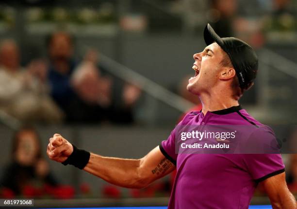 Borna Coric of Croatia gestures against Andy Murray of Great Britain during the ATP Masters 1000 Open men's tennis match within the Mutua Madrid Open...