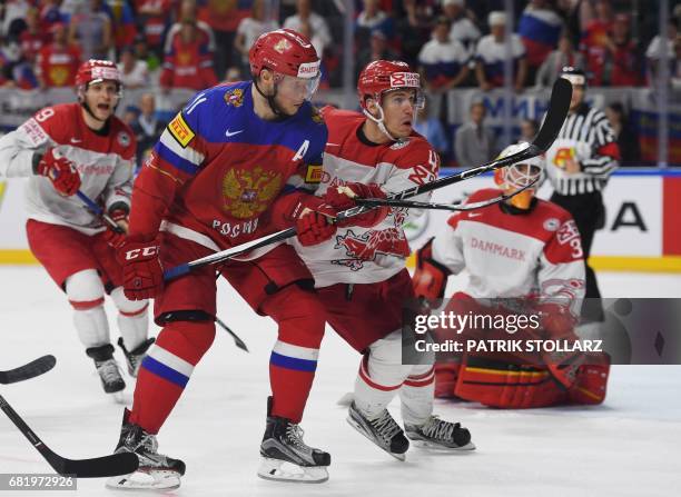 Russia's Sergei Andronov and Denmark's Mikkel Aagaard vie during the IIHF Ice Hockey World Championships first round match between Russia and Denmark...