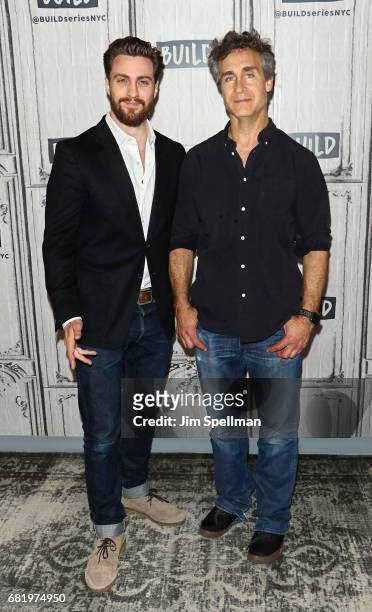 Actor Aaron Taylor Johnson and director Doug Liman attend Build to discuss the new film "The Wall" at Build Studio on May 11, 2017 in New York City.