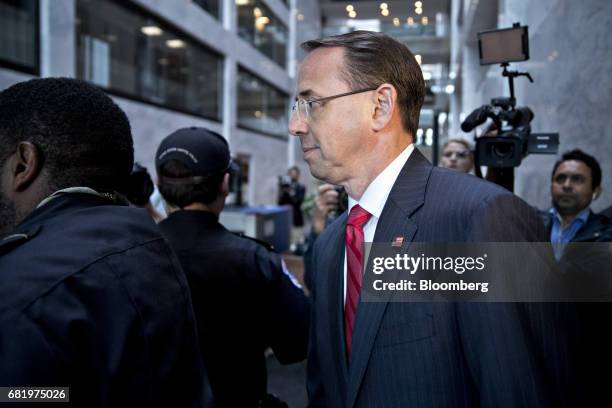 Rod Rosenstein, deputy attorney general, walks through the Hart Senate Office building after a meeting with the Senate Intelligence Committee...