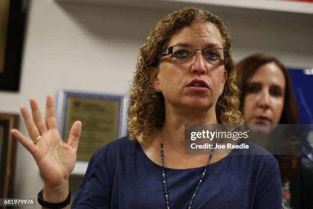 Rep. Debbie Wasserman Schultz speaks with the media after she held a meeting with immigration advocacy group leaders met on May 11, 2017 in Sunrise,...