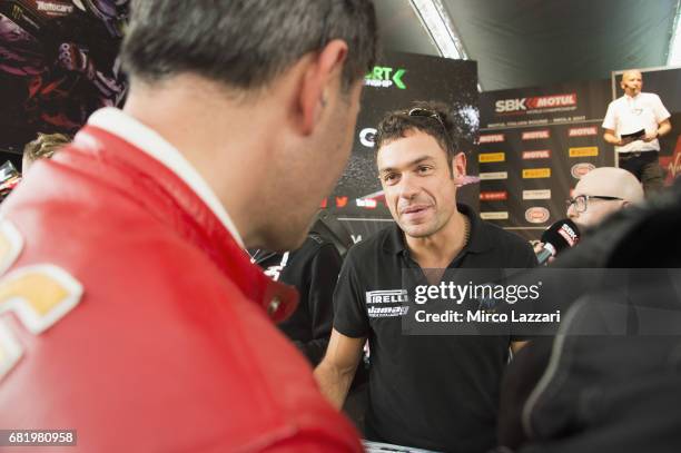 Roberto Rolfo of Italy and Team Factory Vamag smiles with fans during the Paddock Show during the FIM Superbike World Championship - Preview at...