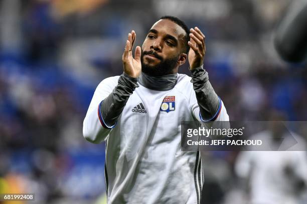 Lyon's French forward Alexandre Lacazette warms up prior to the Europa League semi-final football match Olympique Lyonnais versus Ajax Amsterdam on...