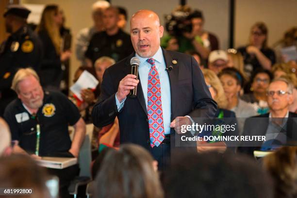 Representative Tom MacArthur speaks to constituents during a town hall meeting in Willingboro, New Jersey on May 10, 2017. MacArthur wrote the...