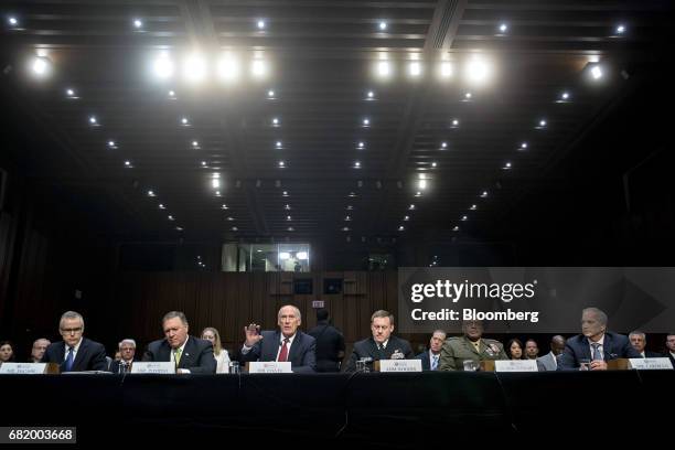 Andrew McCabe, acting director of the Federal Bureau of Investigation , from left, Michael Pompeo, director of the Central Intelligence Agency , Dan...