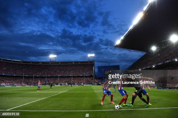 General view as Karim Benzema of Real Madrid takes on Stefan Savic of Atletico Madrid during the UEFA Champions League Semi Final second leg match...