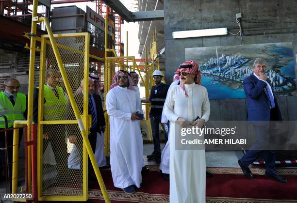 Saudi Prince Alwaleed bin Talal arrives for a press conference on May 11 in the Red Sea city of Jeddah. The completion date for the world's tallest...