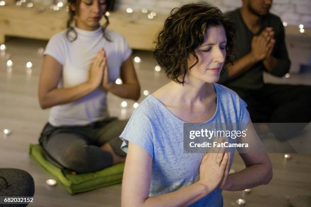 mindfulness - candle light stock pictures, royalty-free photos & images