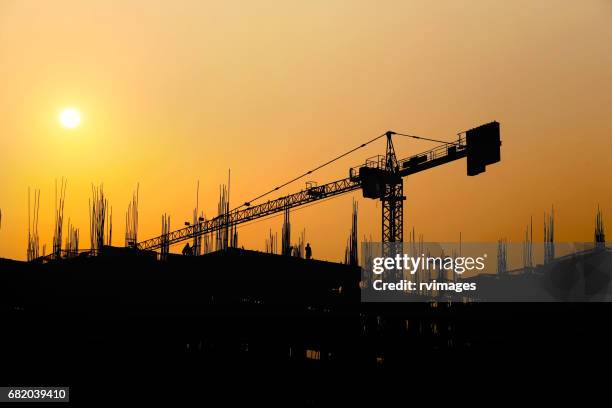 construction crane silhouette - blank construction sign stock pictures, royalty-free photos & images